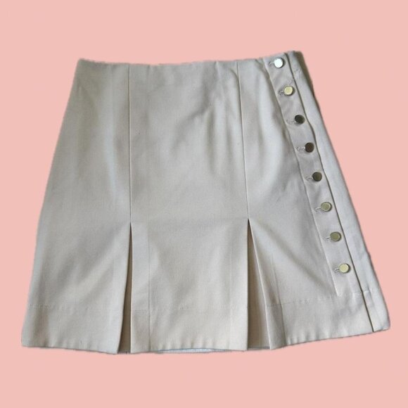 Chic and versatile Club Monaco mini skirt in a soft pink-beige shade - Picture 1 of 8